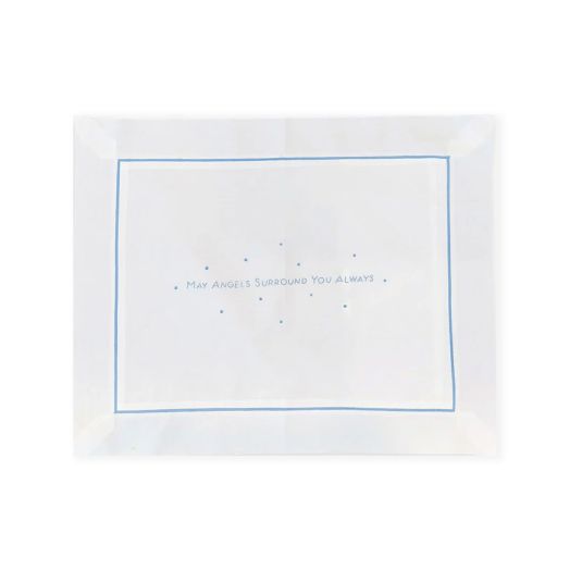 Pillow with "may angels surround you always" embroidered on it