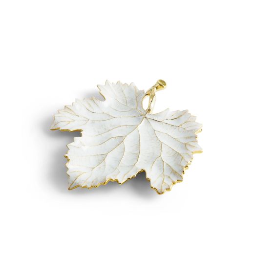 lead shaped dish with golden accents