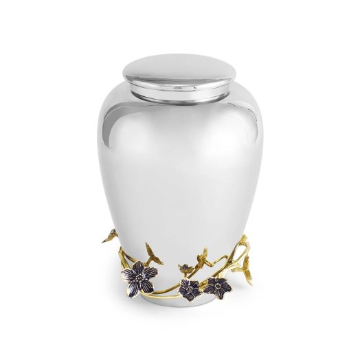 stainless steel urn with golden leaves and purple flower details at bottom