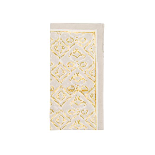tan and yellow designed napkin