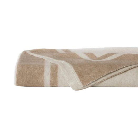 tan and cream colored blanket