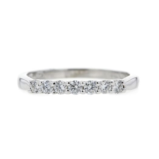 white gold band with seven petite diamond rounds