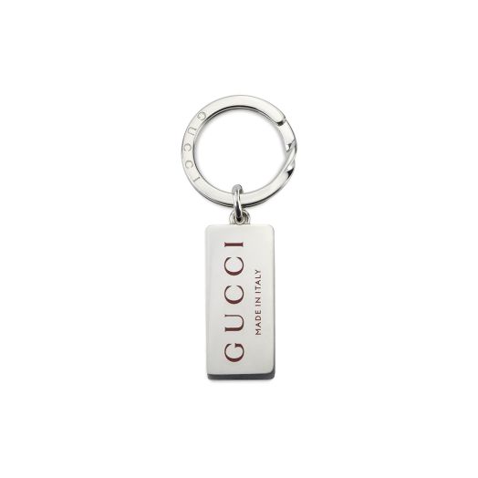 silver pendant keychain with Gucci logo in red enamel