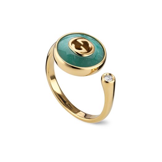 gold open ring with diamond on one end and blue enamel on other with  double g emblem