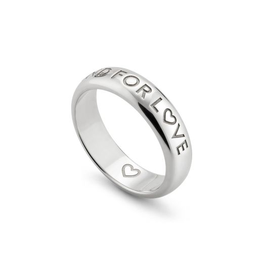 silver ring engraved with "blind for love"