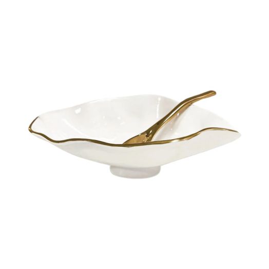 white bowl with unique wave pattern and golden rim with golden spoon