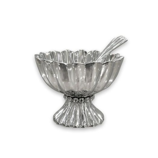 metalware bowl with pedestal base and spoon