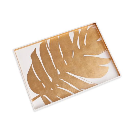 White serving tray with a gold tropical leaf