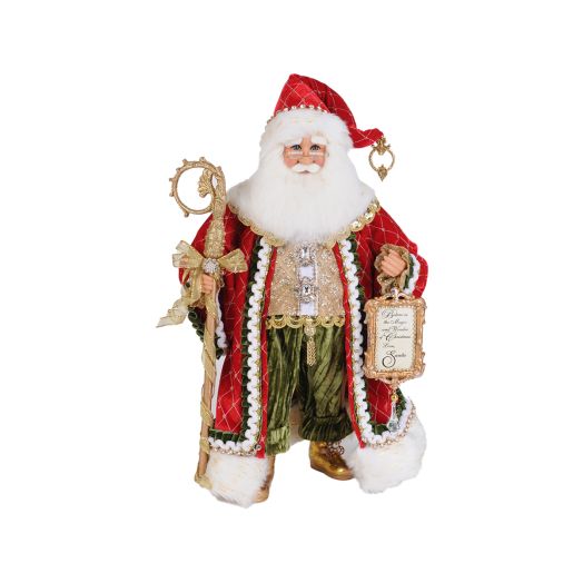 Santa figurine holding a golden staff